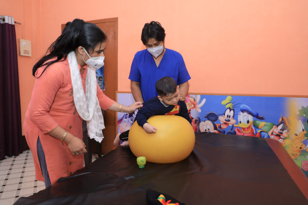 Mom comforting her child during therapy #2